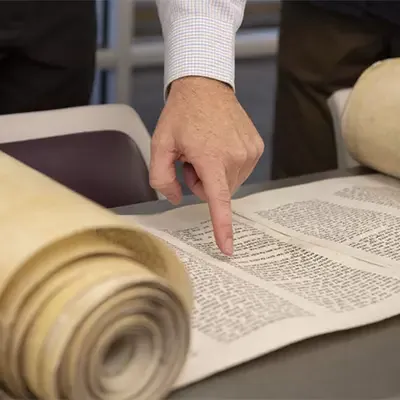 Torah scroll on a table.